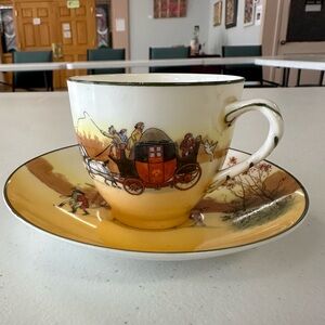 Antique Teacup and Saucer with Carriage Design